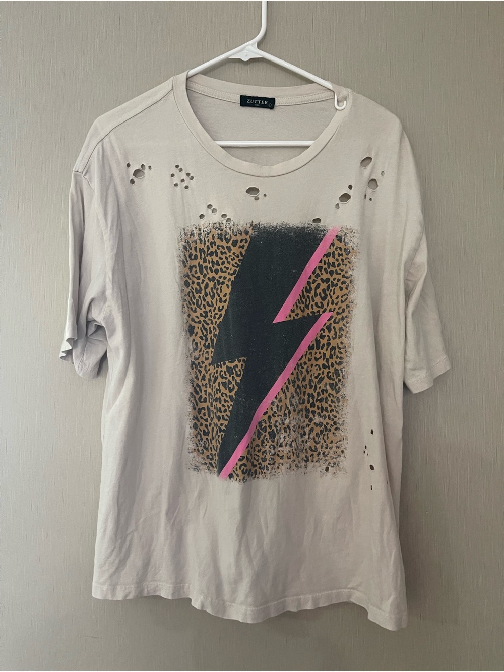 Zutter boutique distressed large loose Cream Graphic Tee Pink Lightning band tee